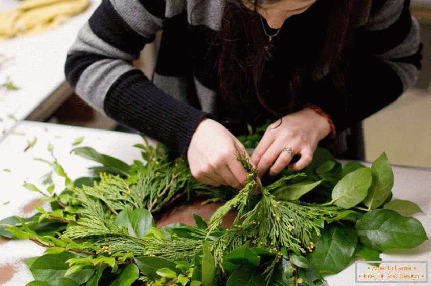 We make a new year's wreath at the door with our own hands