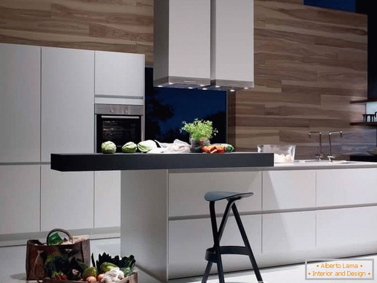 White kitchen in combination with wood and a hood from the ceiling with lining