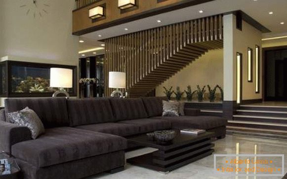 Ultramodern interior of the living room in a private house with a staircase