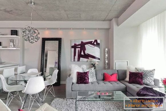 Gray wall color in the interior of the apartment in the loft style