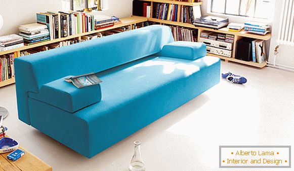 Turquoise sofa in the bright living room