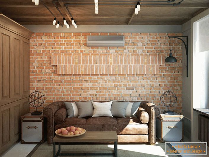 A wall of brickwork is noteworthy. Lighting is also matched to the loft style.