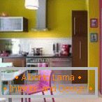 Kitchen with violet-yellow walls