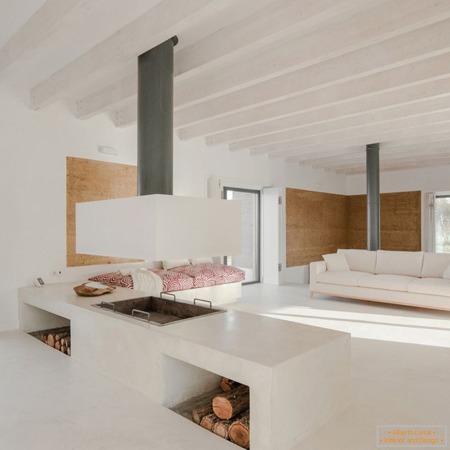 Ecohouse from the pressed earth organically blended into the