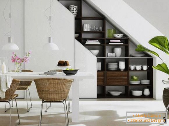Functional cupboard under the stairs in a private house - 35