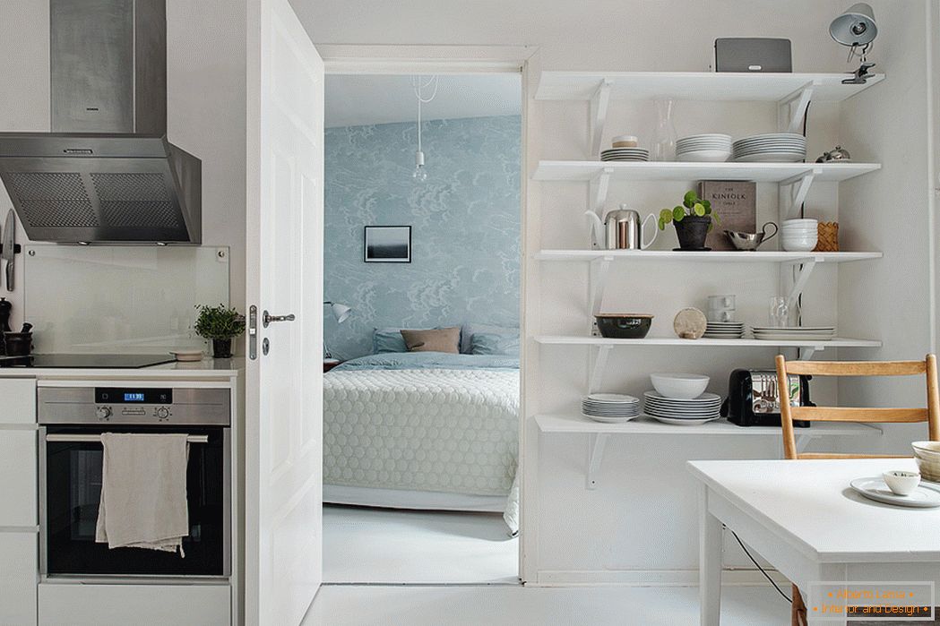 Glossy interior decoration of a small apartment - a tribute