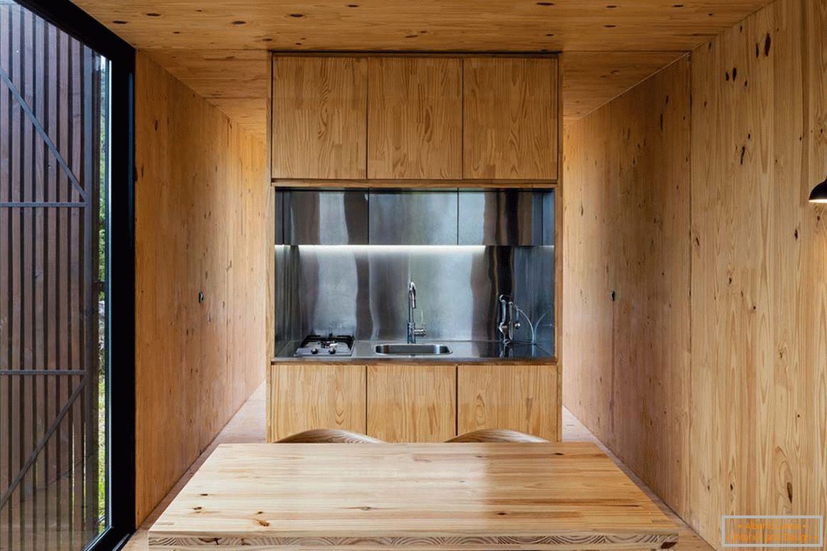 The interior of a small house from mapa architects: the