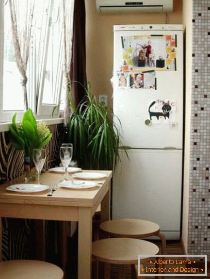 Combining a balcony with a small kitchen - we expand the