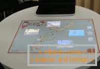 Touch interface for data exchange between digital and real