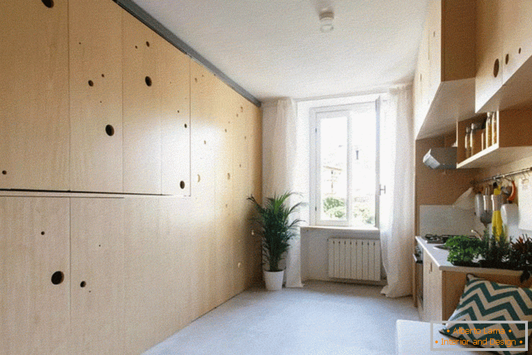 The interior of a small apartment in milan transformed to